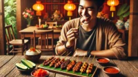 A person enjoying delicious Sate Maranggi skewers, grilled to perfection, with a side of fresh sambal and pickled vegetables. A person enjoying delicious Sate Maranggi skewers, grilled to perfection, with a side of fresh sambal and pickled vegetables.